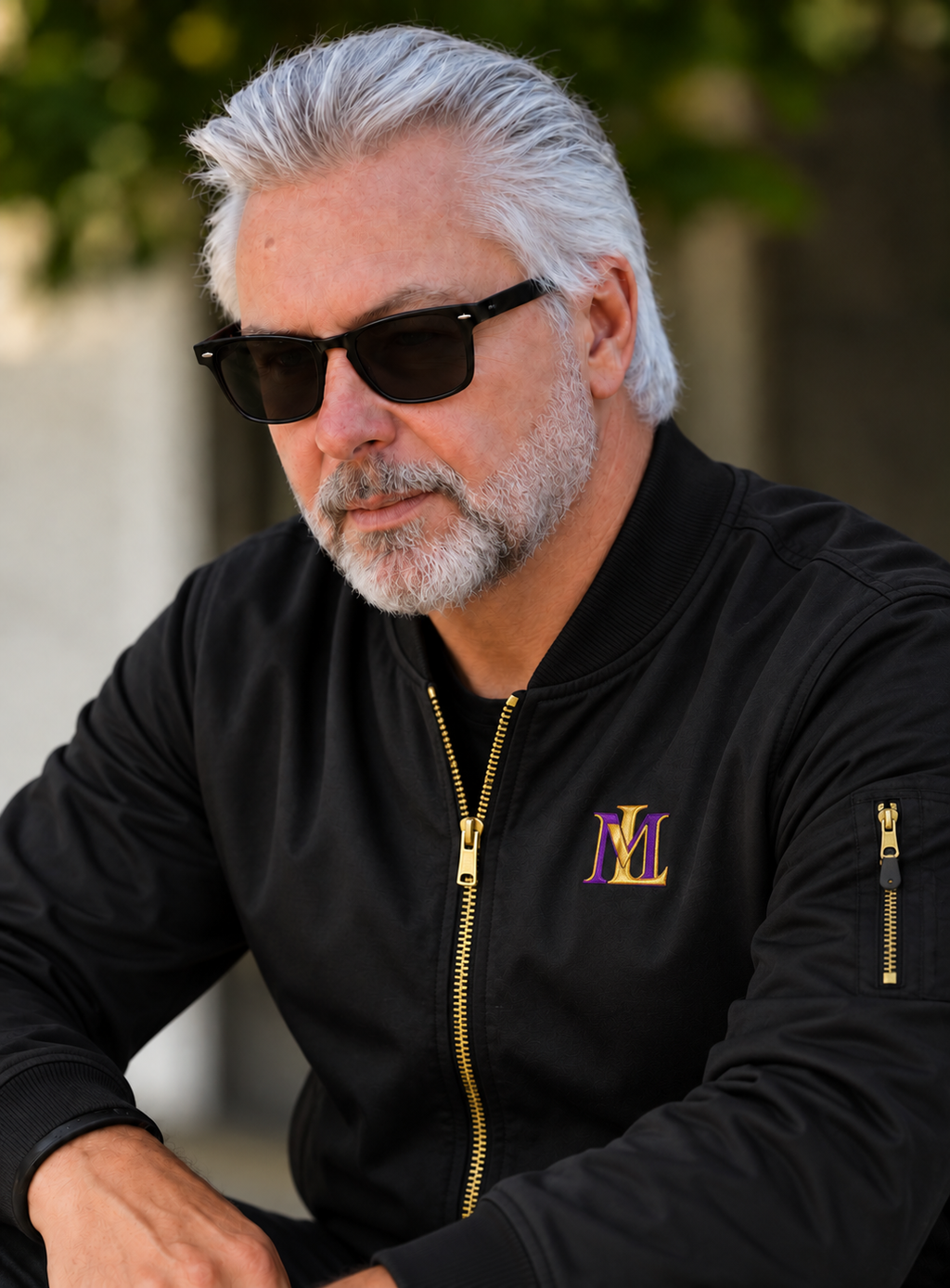 Michael McQueen modeling the black ML bomber jacket